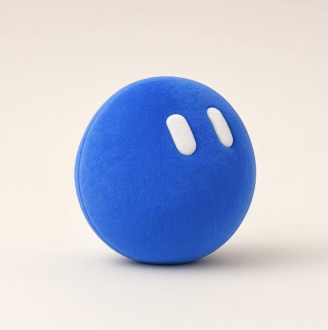 Grok Bot, a round blue plush